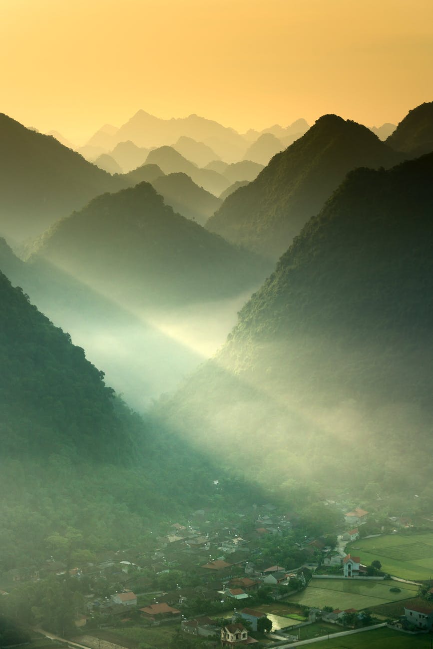 village in front of the mountains